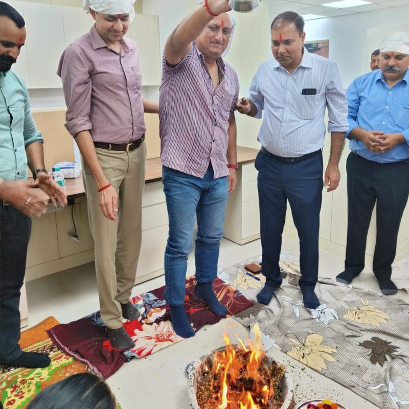 The Havan fire ceremony held to inaugurate the new office space