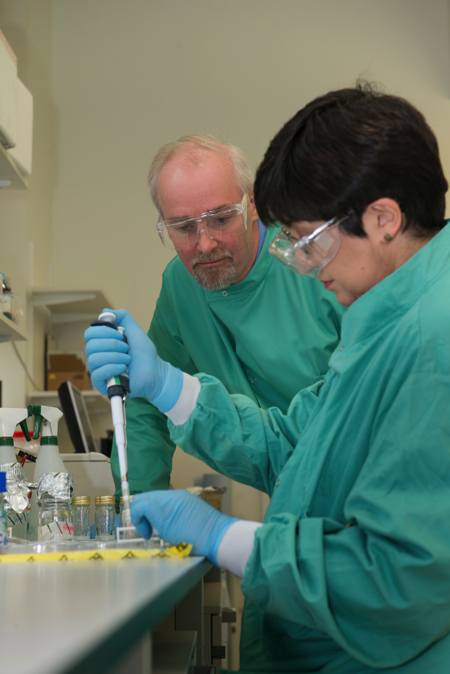 Professor Bill Keevil (left) and research fellow Sarah Warnes testing copper at Southampton University