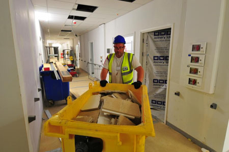 Ceiling tile off-cuts were put into wheelie bins, then transferred to bags that were trucked back to the Armstrong factory in Gateshead for recycling
