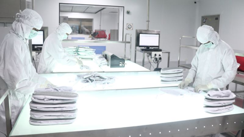 The cleanroom covers more than 50,000 sq ft of space and <br>has a capacity of servicing 400,000 items of uniforms per month