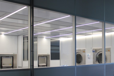 External view of the CleanCell4.0 cleanroom system <br>looking through the large cleanroom windows