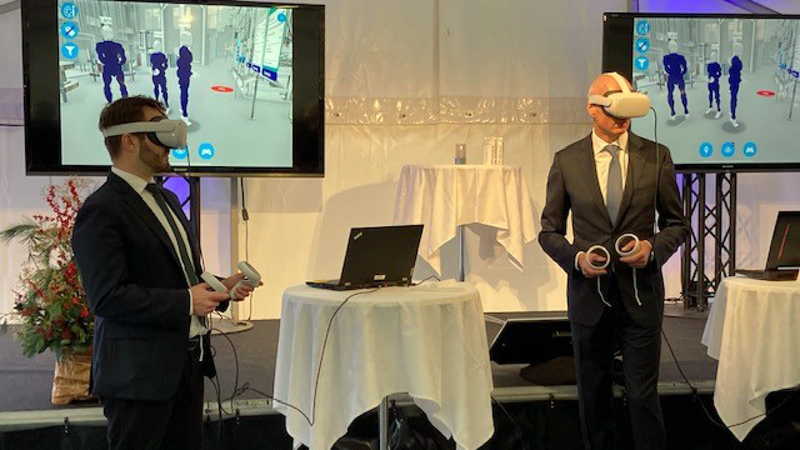 Novo Nordisk CEO, Lars Fruergaard Jørgensen and Minister of Industry, Business and Financial Affairs, Simon Kollerup, take a tour in the virtual facility created by NNE in connection with the groundbreaking ceremony for the project