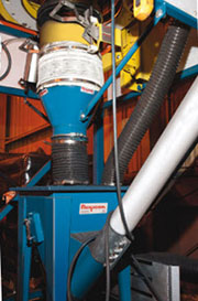 Bulk bag handling system keeps compounding line clean