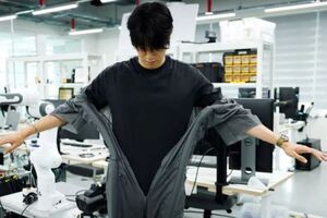 Soft robotic dressing system automates gowning for cleanroom and PPE applications